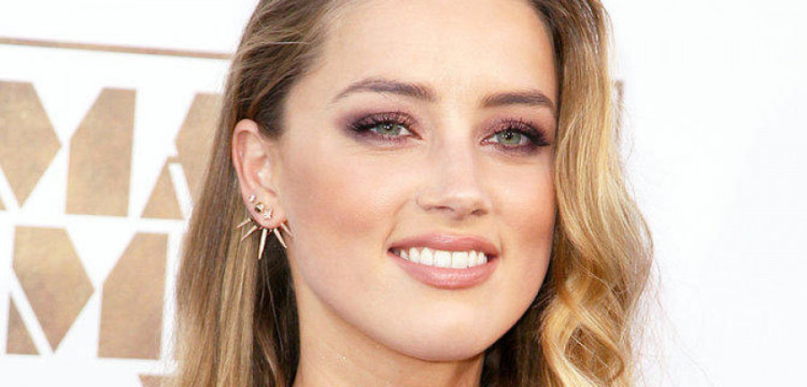 Amber Heard logra una orden  de alejamiento de Johnny Depp