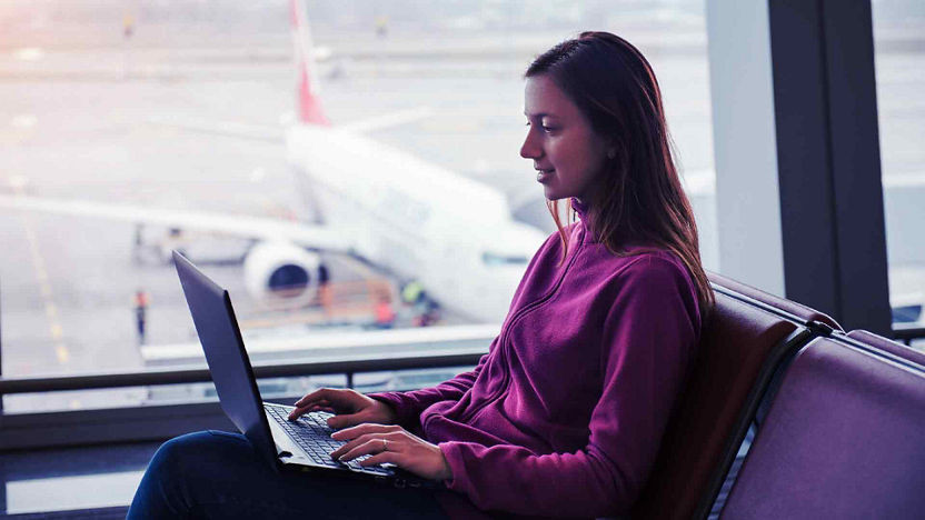 Longer battery life woman laptop airport 1920 1080