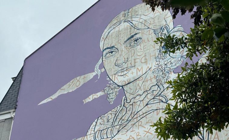 Dúo de altura, mural de impacto: Cristian F. Caruncho y Lidia Cao pintan a la Ghaiteira en Ortigueira